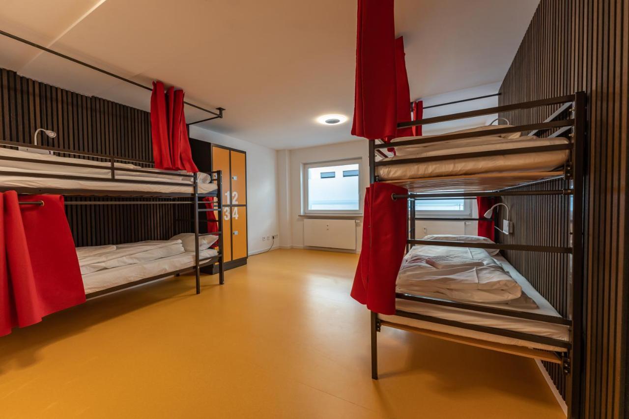 Hostel MHG Extérieur photo Hostel room