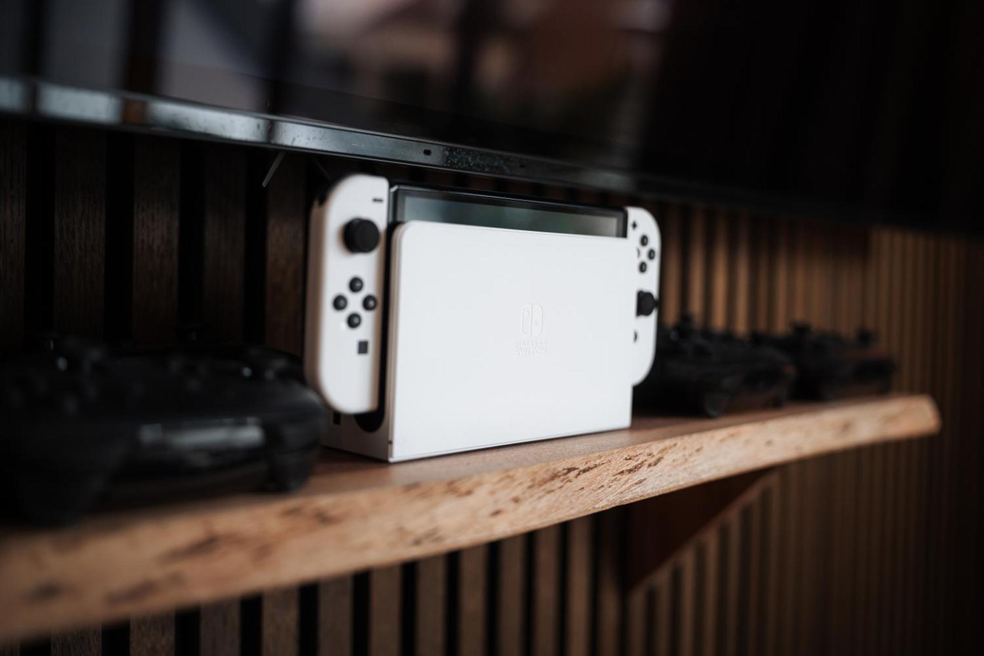 Hostel MHG Extérieur photo A Nintendo Switch docked