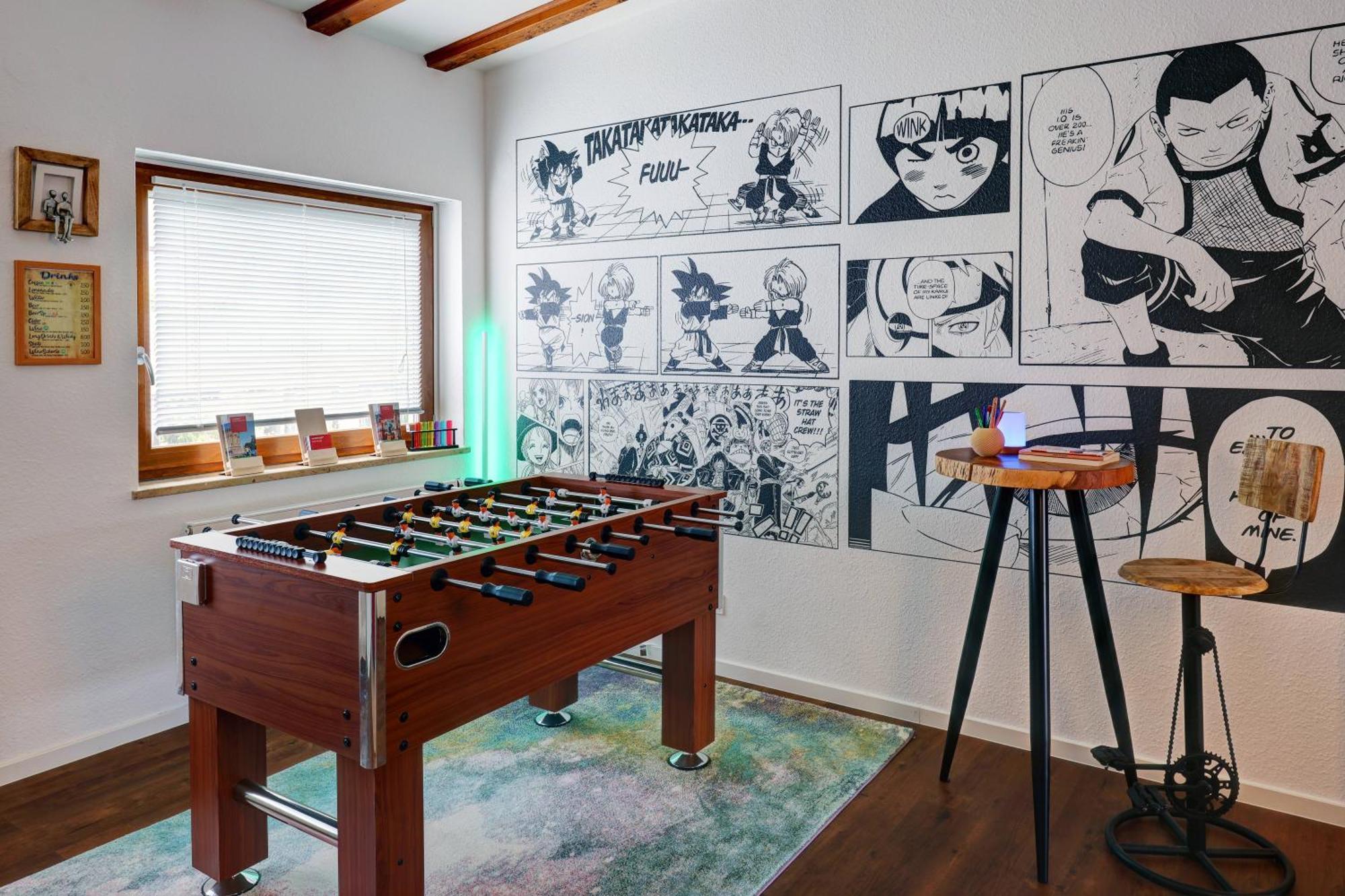 Hostel MHG Extérieur photo A foosball table