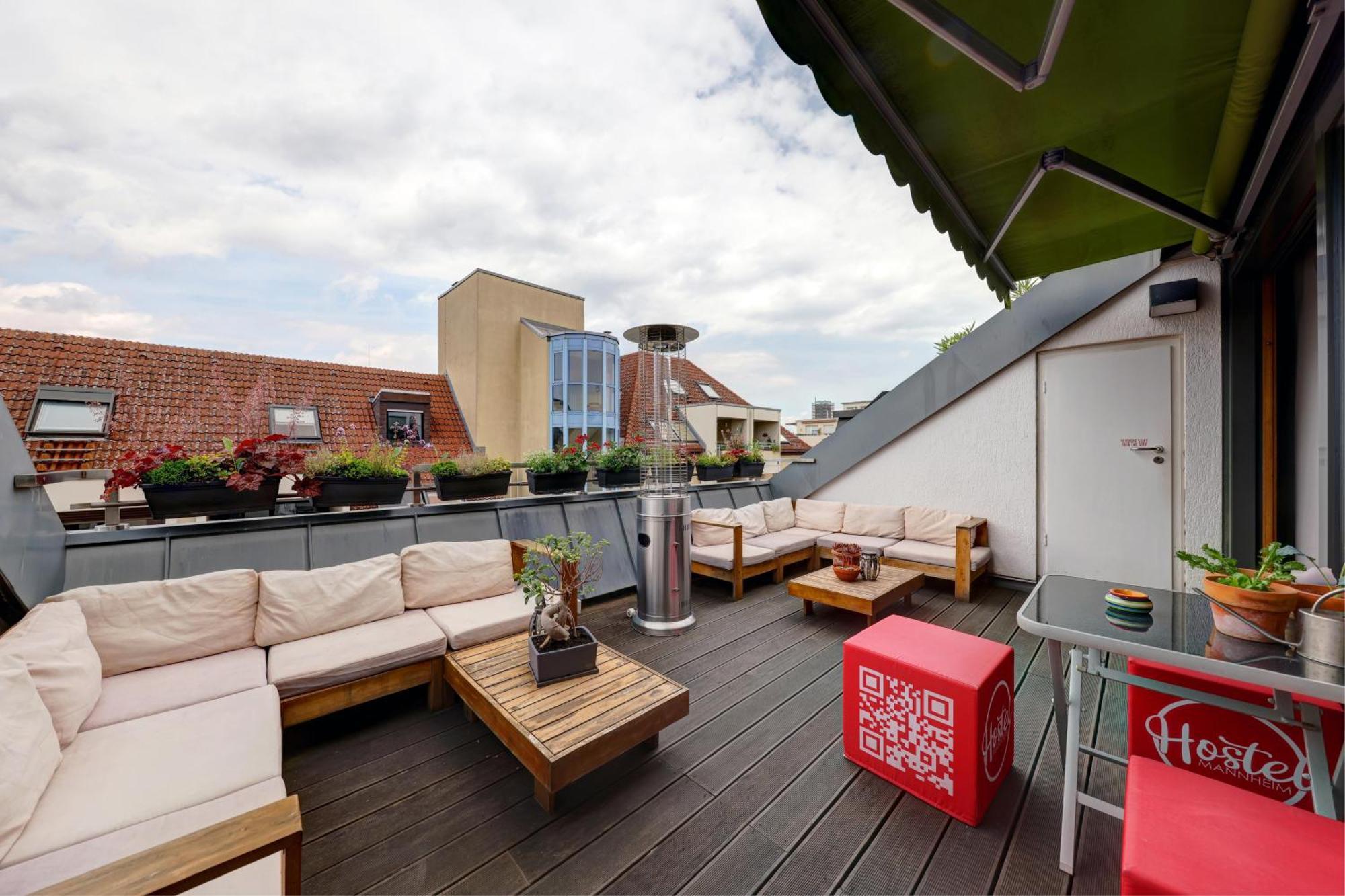 Hostel MHG Extérieur photo Rooftop terrace
